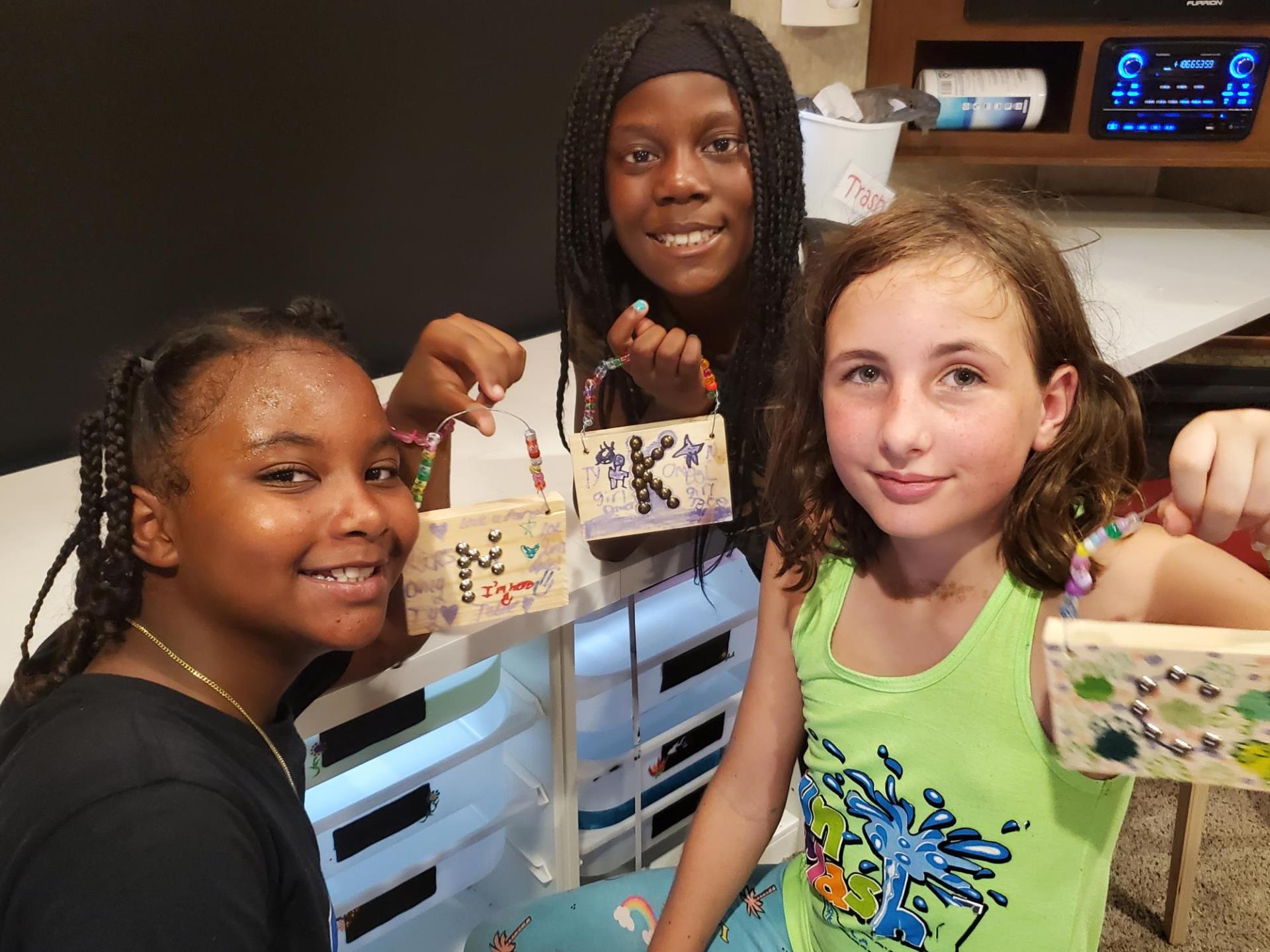 Summer Campers Displaying Art Project